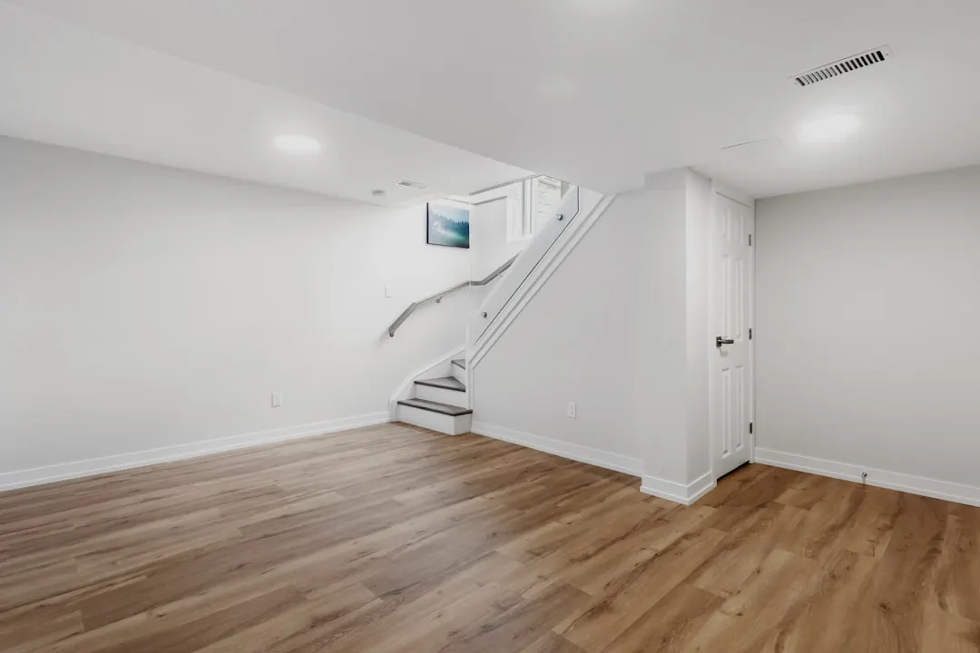 Open finished basement and stairwell