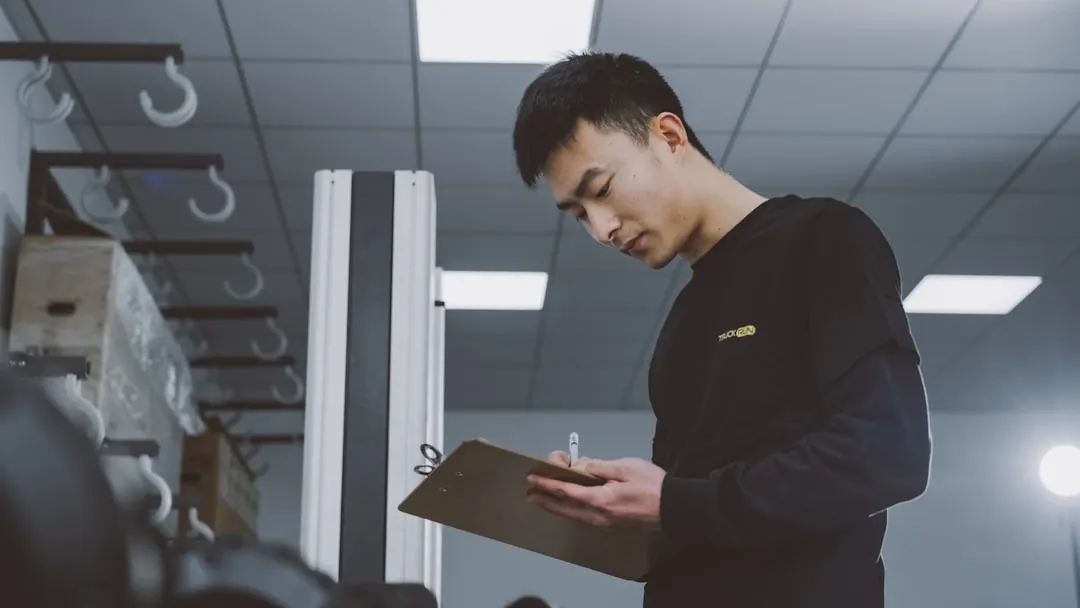 Technician inspecting equipment
