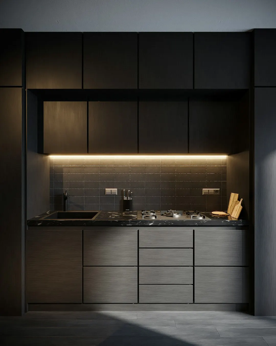 Dark compact kitchen storage and preparation area